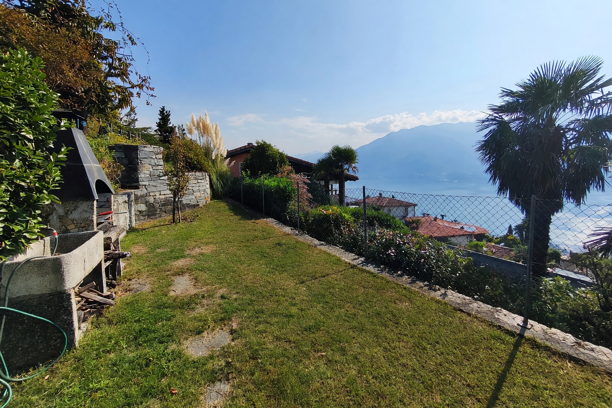 Splendida villa unifamiliare 5,5 locali con meravigliosa vista lago, giardino terrazzato e camino in contesto residenziale esclusivo - Orselina - foto 16